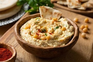 Hummus in Wooden Bowl Hummus in Wooden Bowl